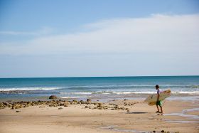 Surfer at Rio Mar Beach, Panama – Best Places In The World To Retire – International Living